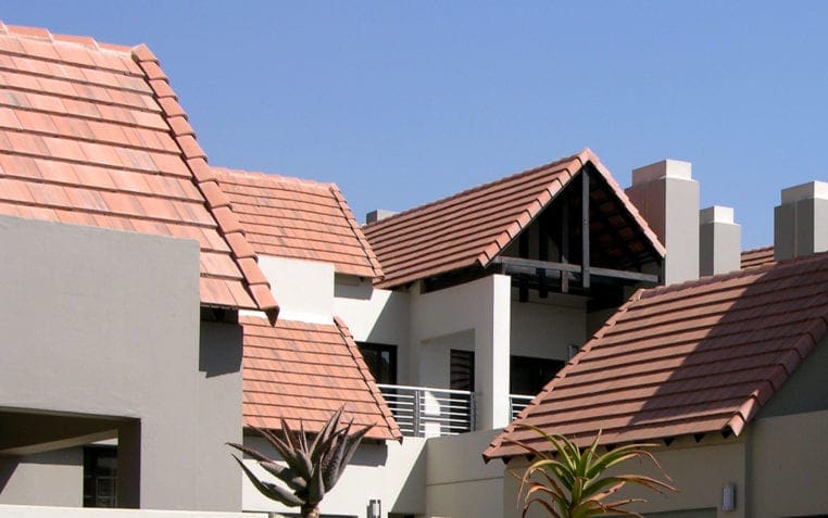 What should I consider when replacing or choosing a new roof?